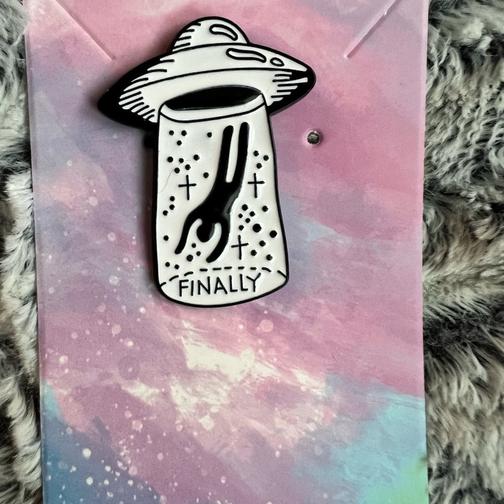 Alien abduction pin